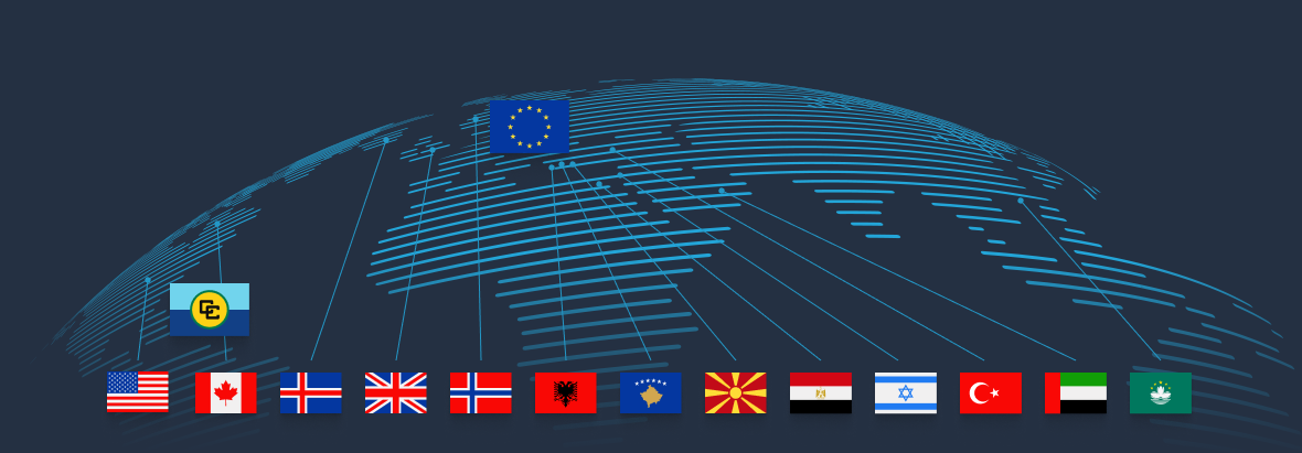 Globe with flags of USA, Canada, UK, Spain, EU, Turkey, Egypt, and UAE, representing countries where PnrGo offers automated API and PNR data transfer.